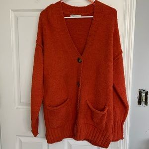 Arizona small orange soft cardigan. Could fit medium!